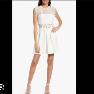 NWT Saks brand Area Stars White Lace Bodice Sexy Mini dress size medium.